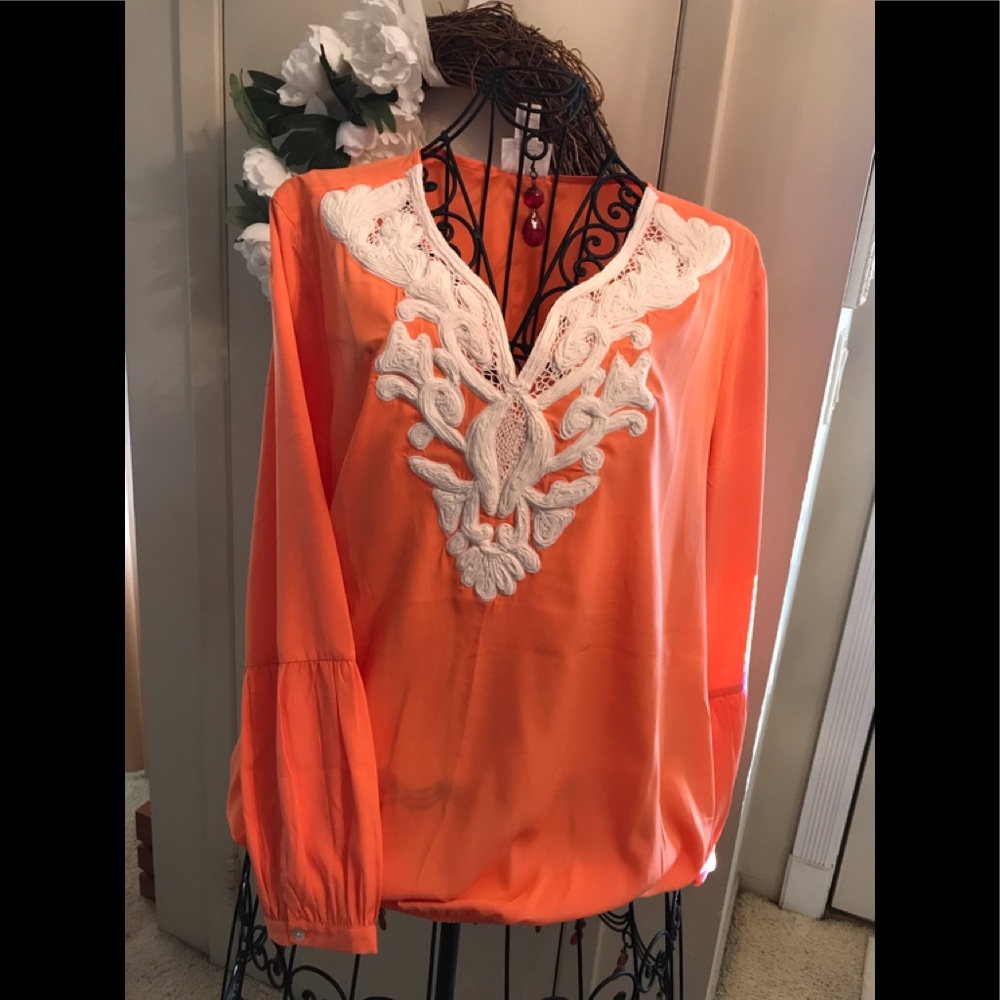 NWOT.  Chico’s beautiful Deep Coral and Cream Blouse